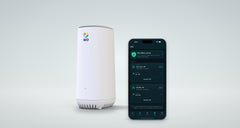 Rio router beside a phone showing the Rio app with Rio VPN active on two tunnels